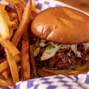 The Blue Note Grill signature dishes Pulled Pork Plate
Pulled Sandwich
Rib Sandwich